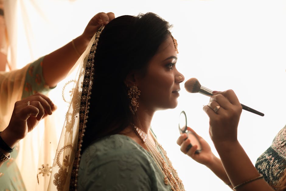 Bride getting ready with her wedding coordinator